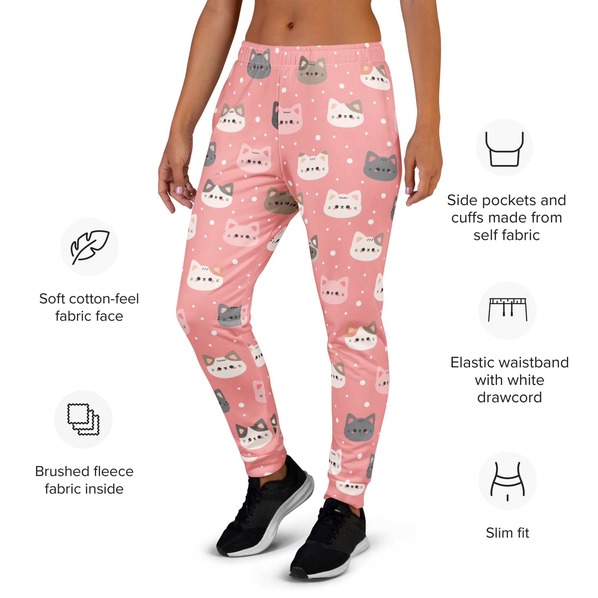 Women’s pink jogger pants with playful gray white and pink cartoon cat pattern soft cotton feel and cozy fleece lining