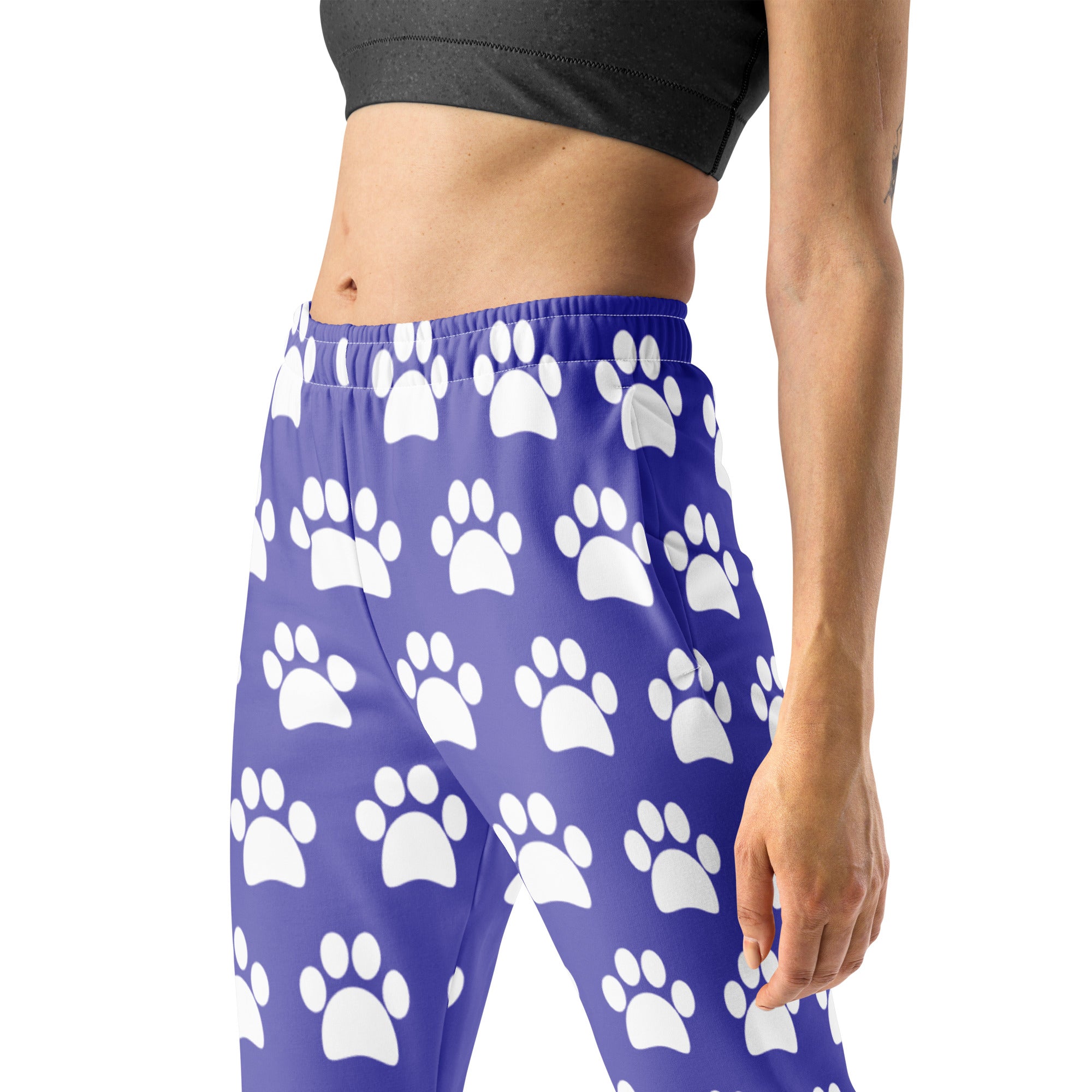 Women’s purple jogger pants with white paw print pattern cozy recycled fleece with pockets