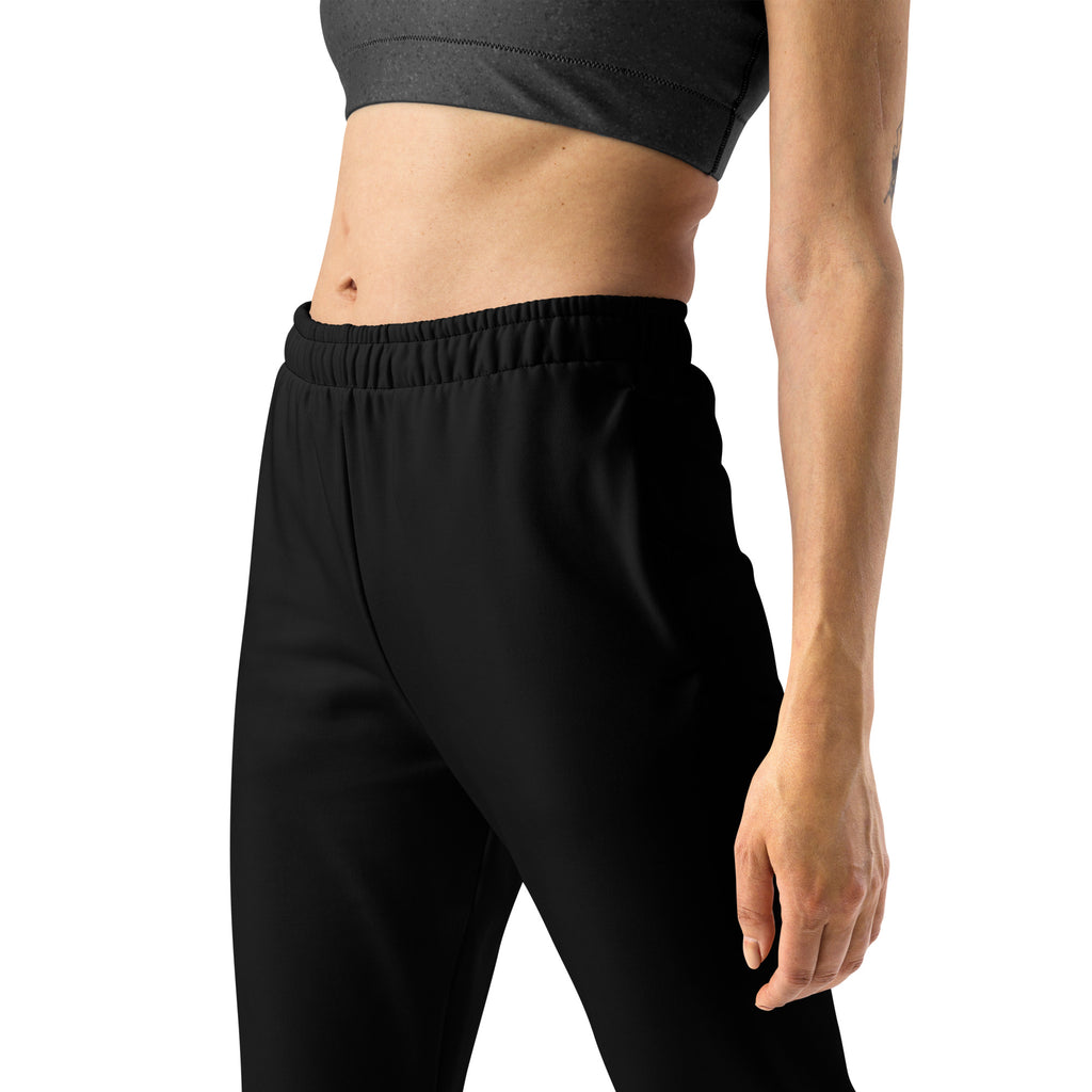 Women’s black recycled jogger pants with pockets featuring cozy brushed inside fleece and elastic waist waistband