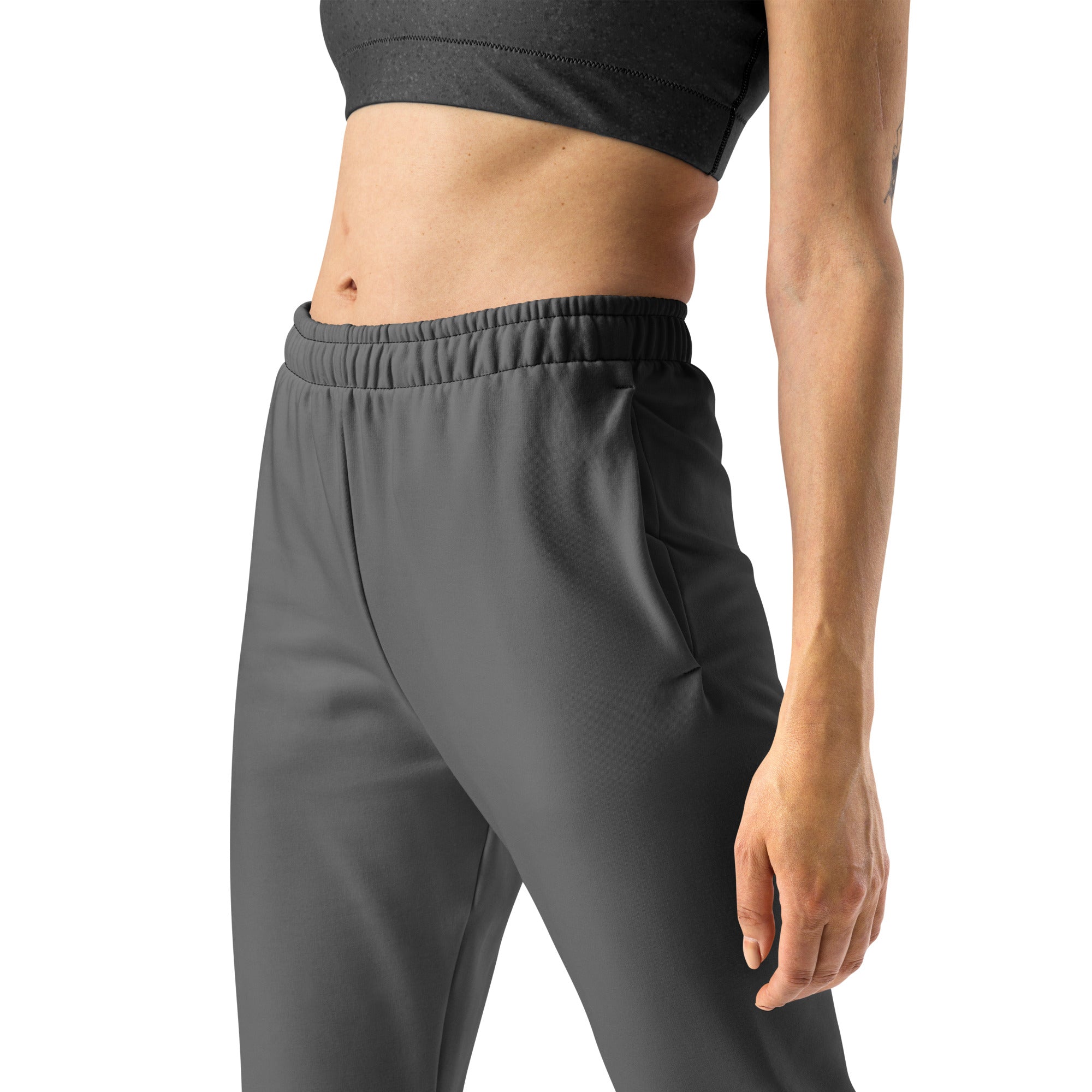 Women’s dark gray recycled jogger pants with elastic waistband side pockets and cozy brushed inside fleece lining