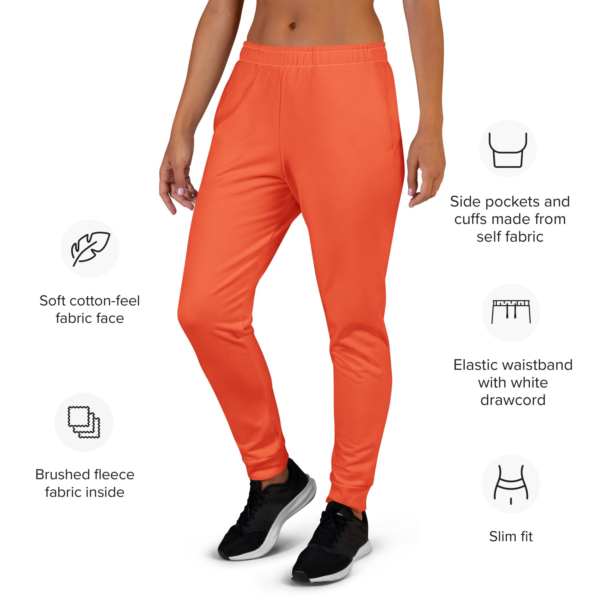 Bright orange women’s recycled jogger pants with soft cotton-feel face, cozy brushed fleece lining, and elastic waistband with white drawcord
