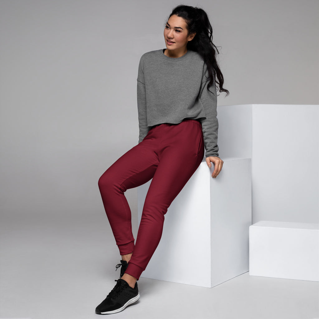 Women’s burgundy recycled jogger pants with pockets cozy brushed inside fleece and ribbed cuffs in a relaxed fit