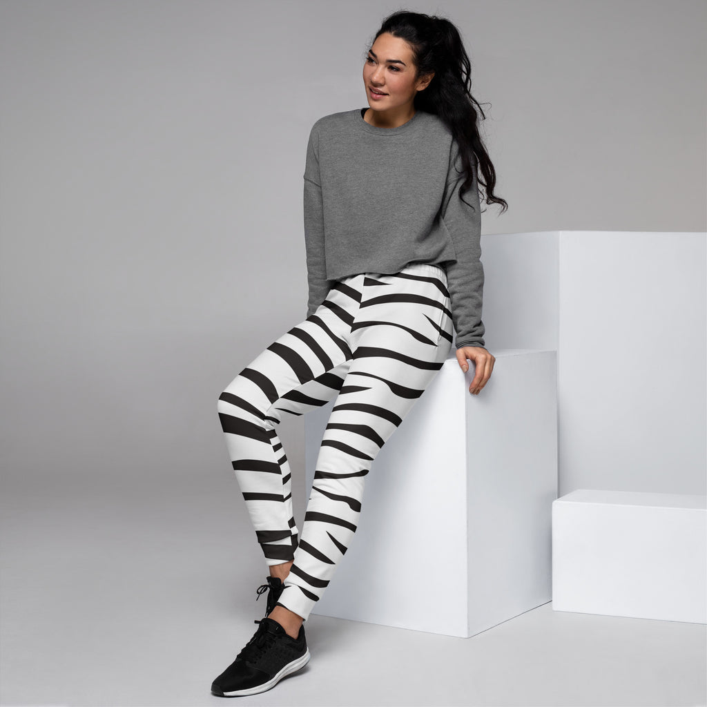 Women’s black and white zebra print recycled jogger pants with pockets and cozy brushed inside fleece lining