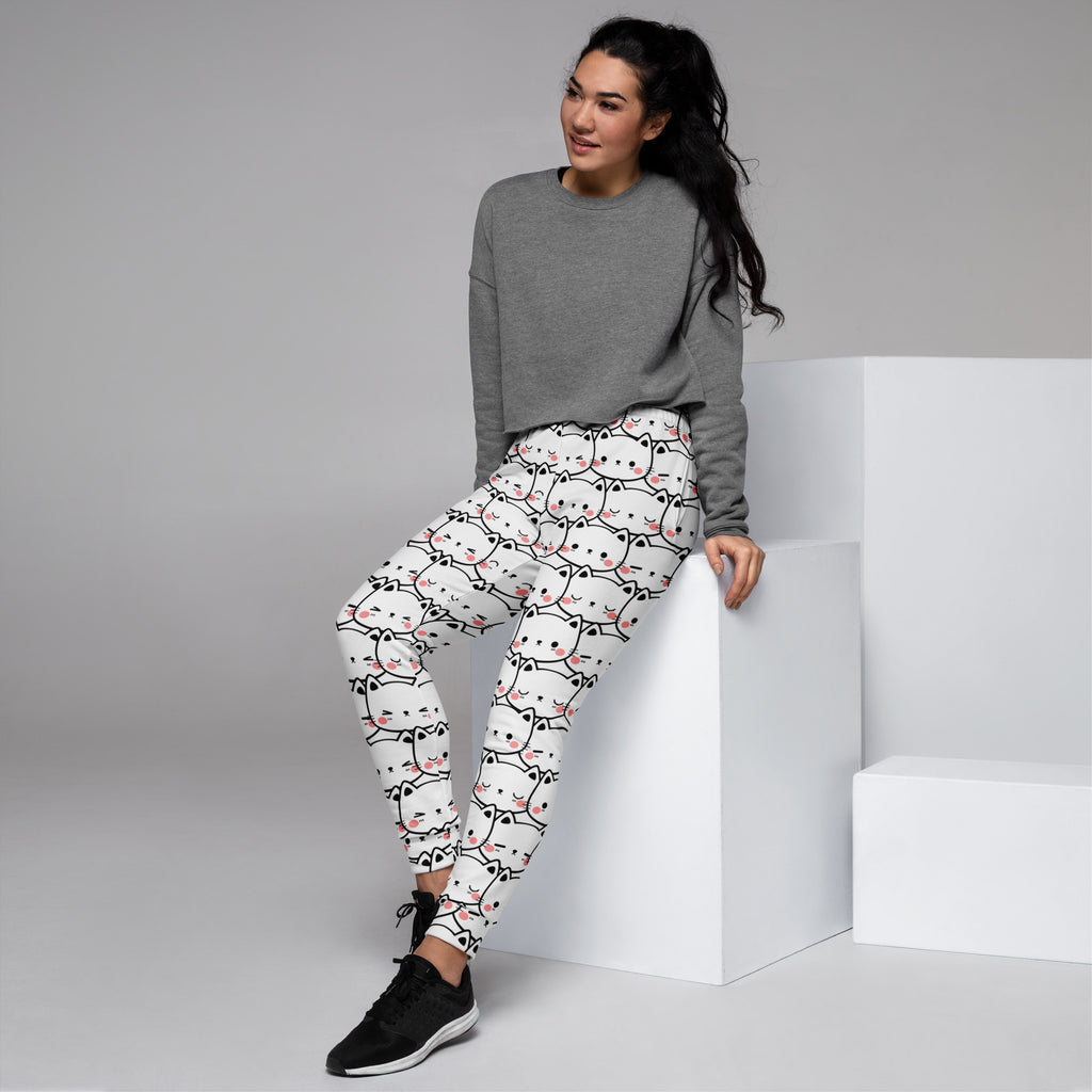 White women’s jogger pants with black outlined cat print pink blush cheeks cozy brushed fleece pockets
