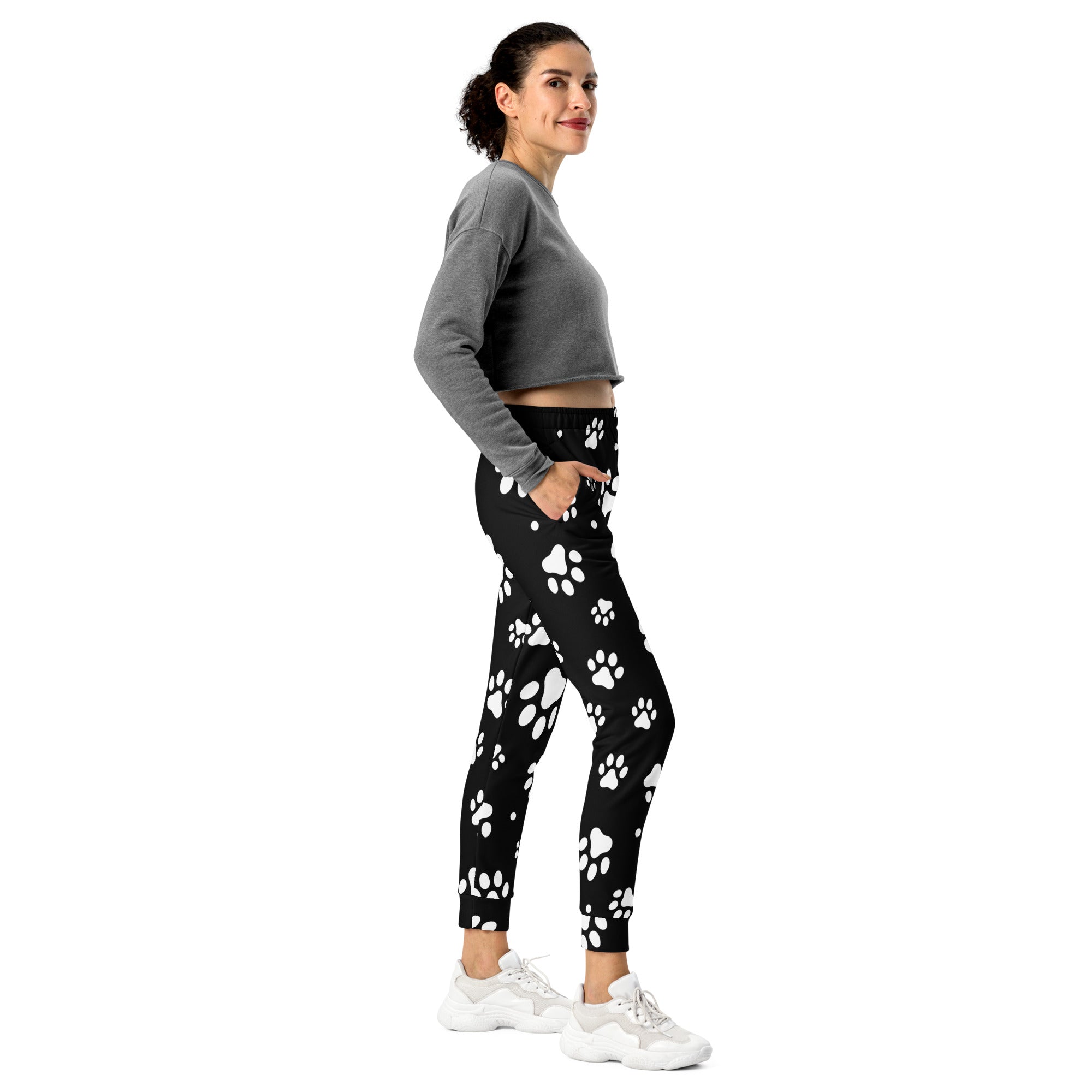 Women’s black recycled jogger pants with white paw print pattern cozy brushed inside fleece and pockets