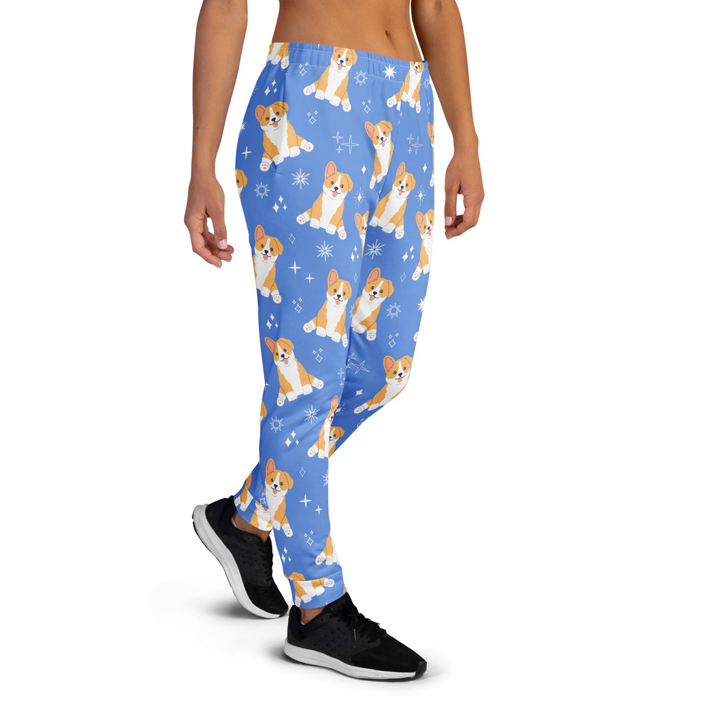 Women’s blue corgi dog recycled jogger pants with pockets featuring a playful corgi and sparkle pattern