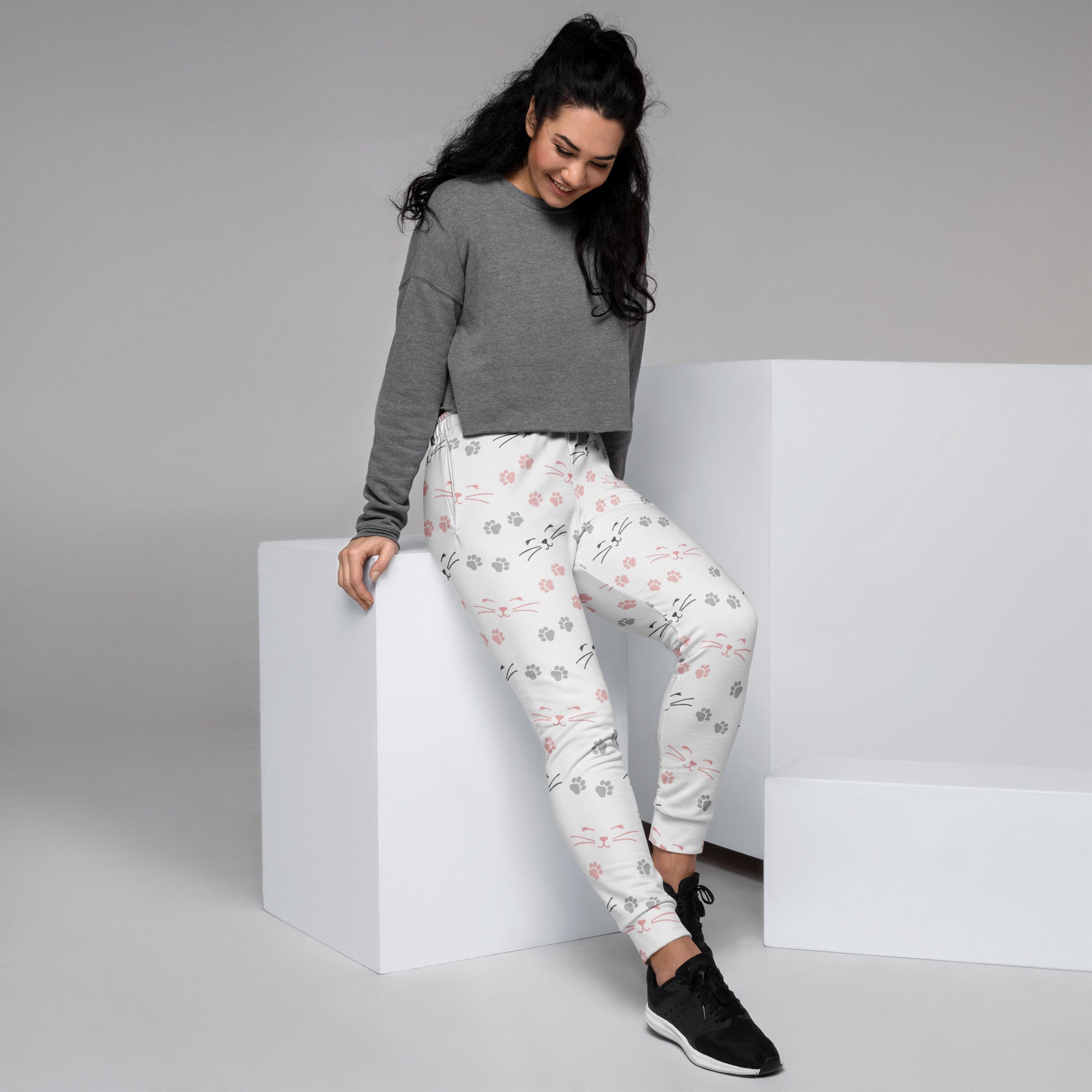 White recycled jogger pants with pink and gray cat faces paw prints cozy brushed fleece with pockets