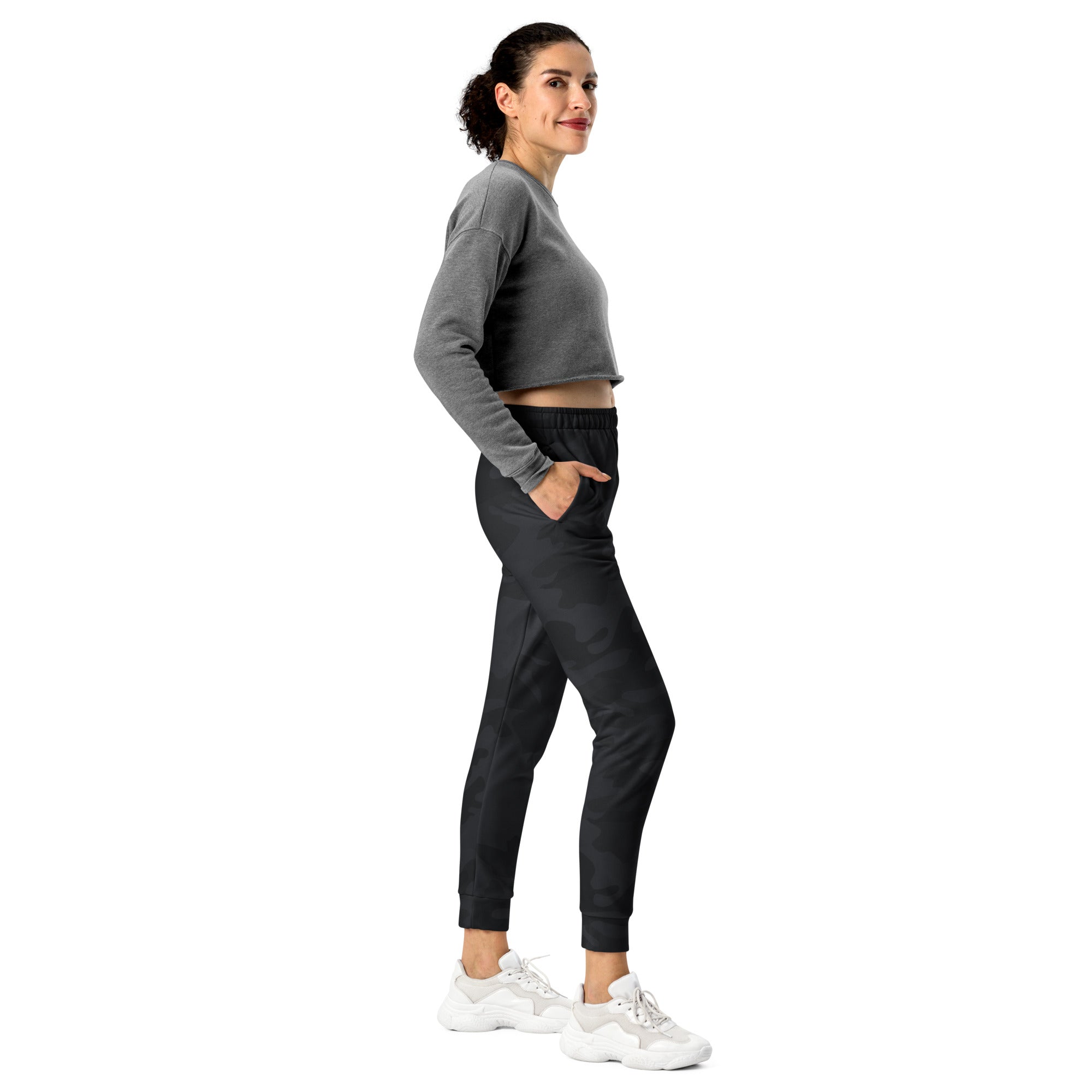 Women’s black camouflage recycled jogger pants with drawstring waistband side pockets and cozy brushed fleece lining