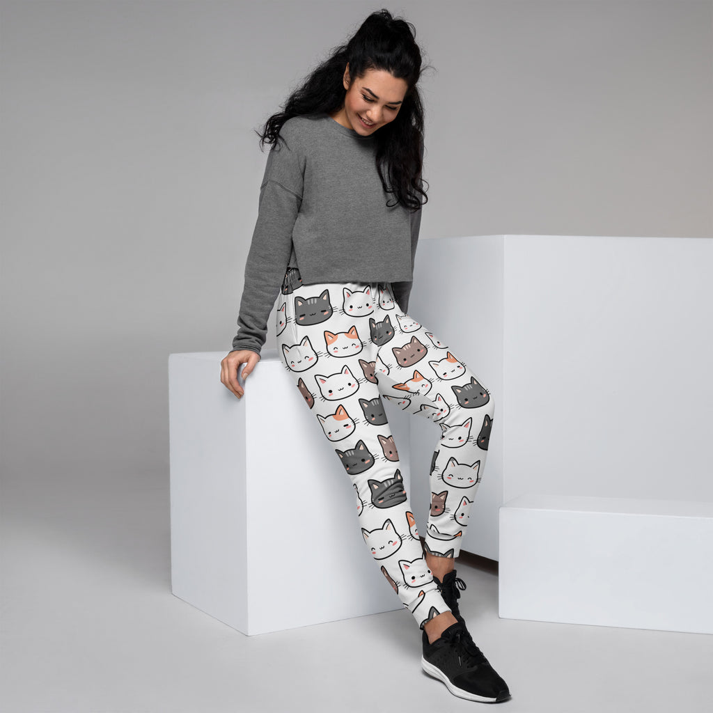 Women’s white recycled jogger pants with colorful cartoon cat faces cozy brushed fleece inside and pockets