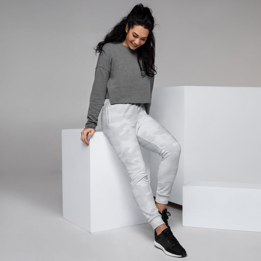 Women’s gray camouflage recycled jogger pants with pockets paired with a gray cropped sweatshirt with long sleeves and round neckline