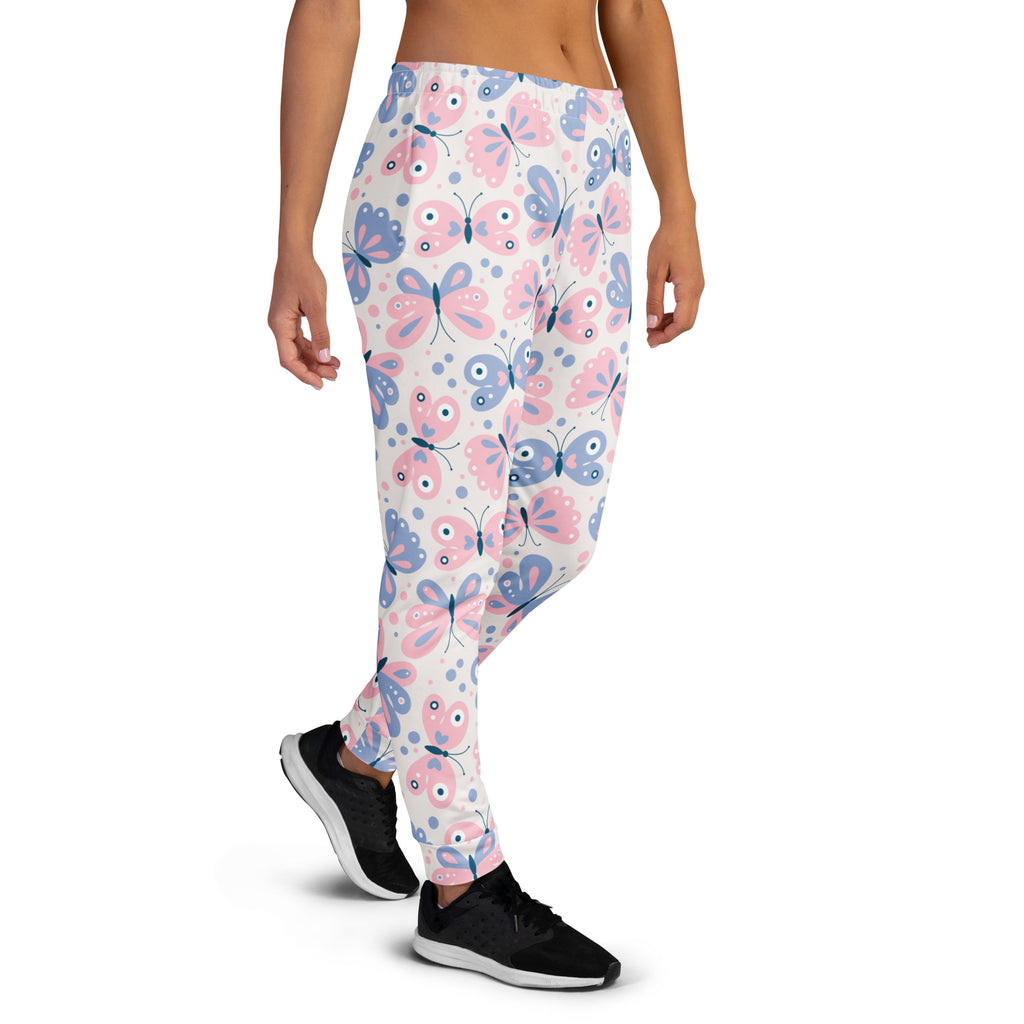 White leggings with pink and blue cartoon butterfly pattern black outlines made from cozy recycled fleece jogger pants