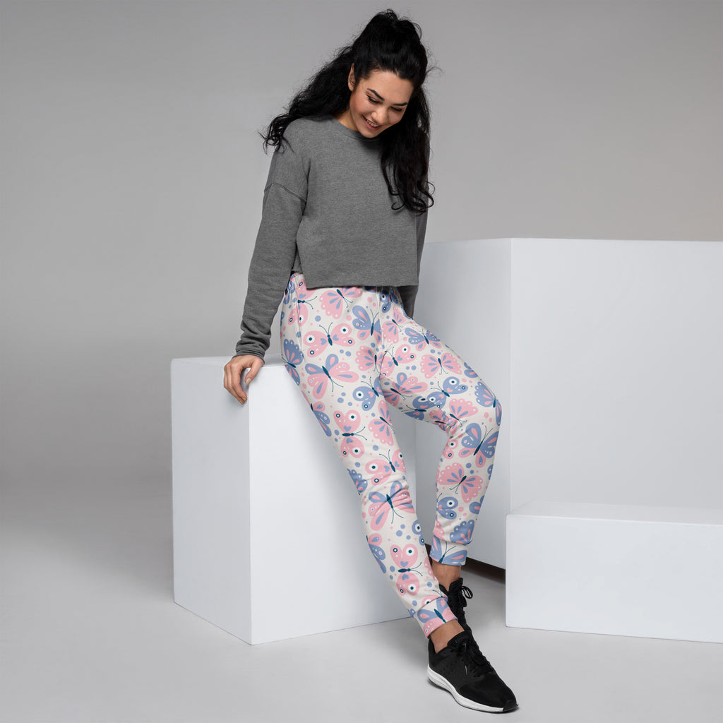 Women’s colorful pink and blue butterfly patterned recycled jogger pants with cozy brushed fleece and pockets
