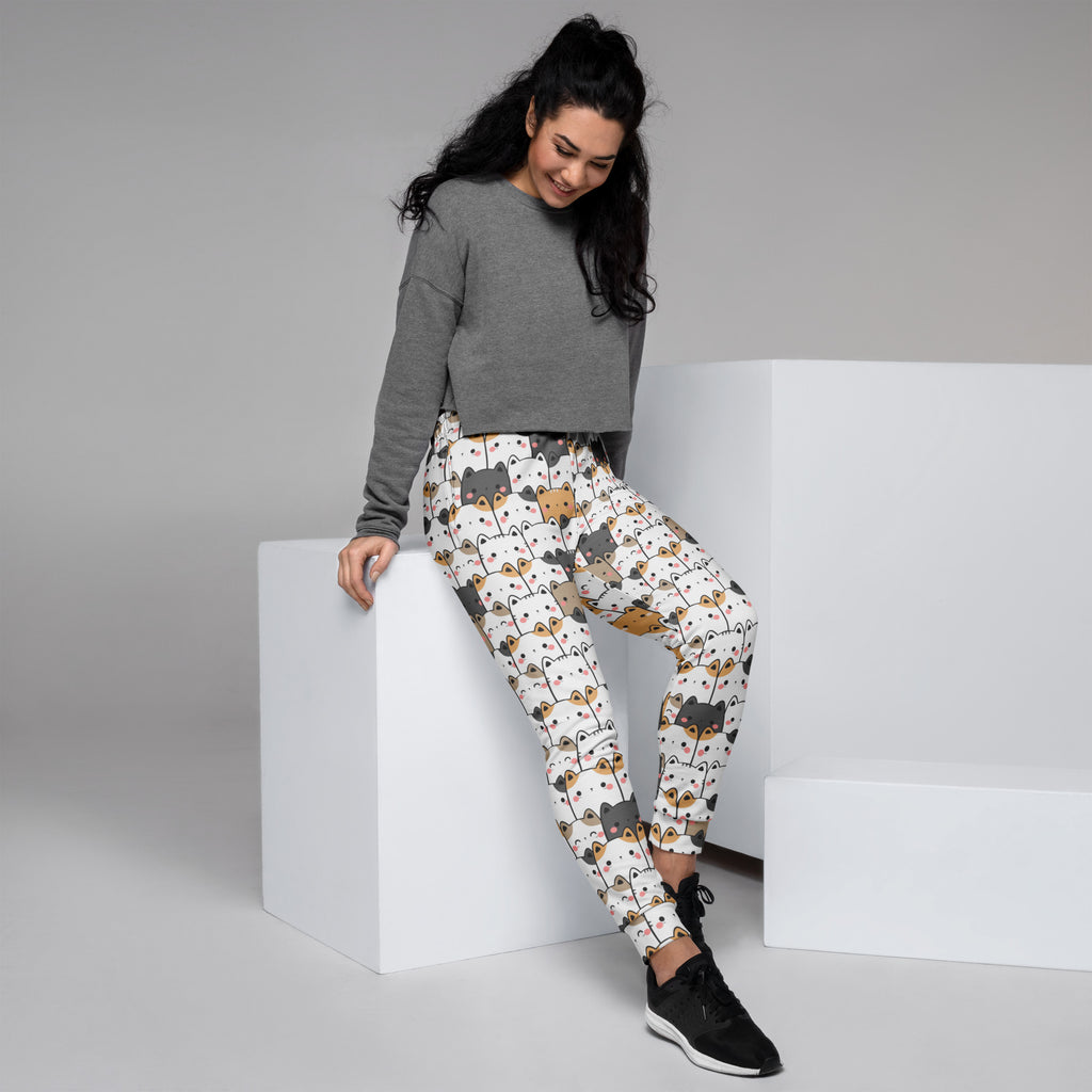 White leggings with playful colorful cartoon cat pattern made of cozy brushed fleece for women with pockets