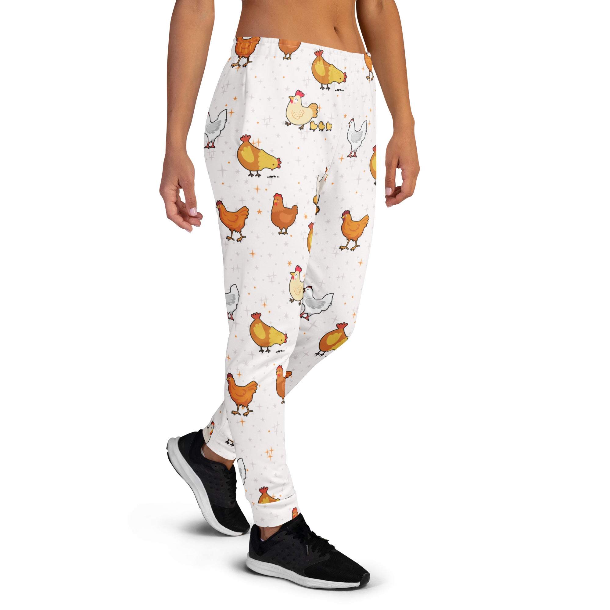 Women’s white chicken recycled jogger pants with pockets featuring playful orange yellow and gray chicken pattern and stars