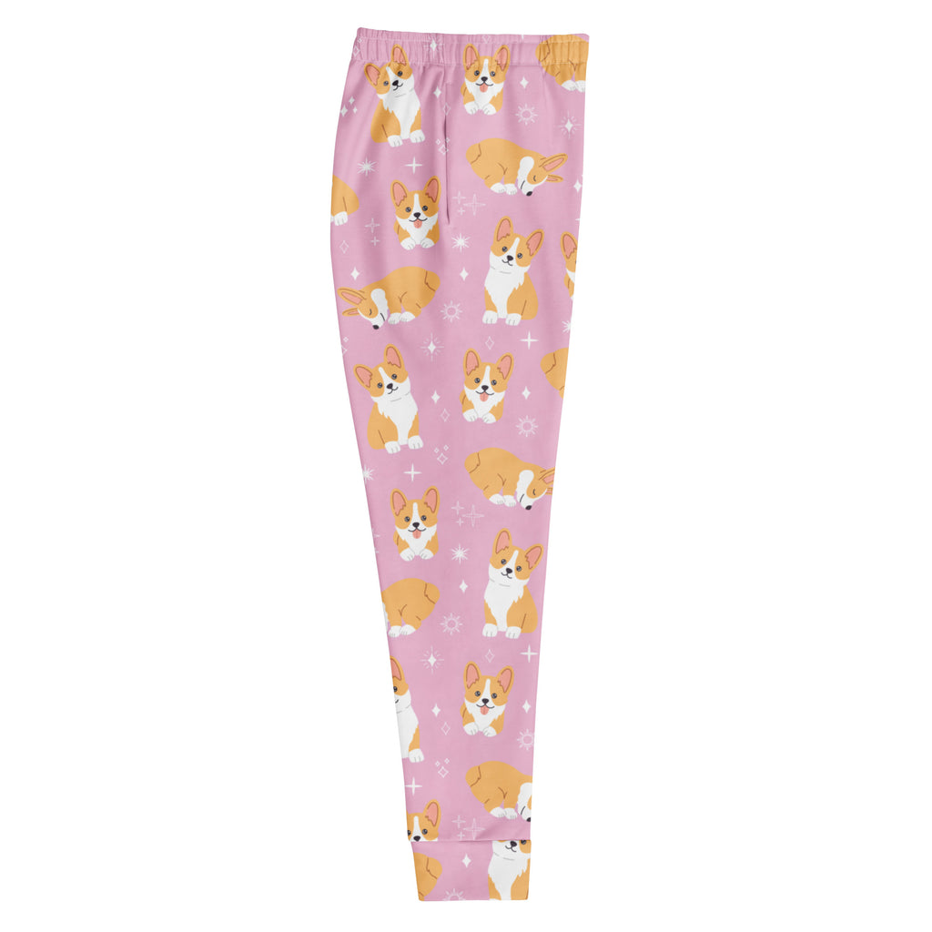 Women’s pink recycled jogger pants with cozy brushed fleece inside featuring playful tan and white corgi dog pattern