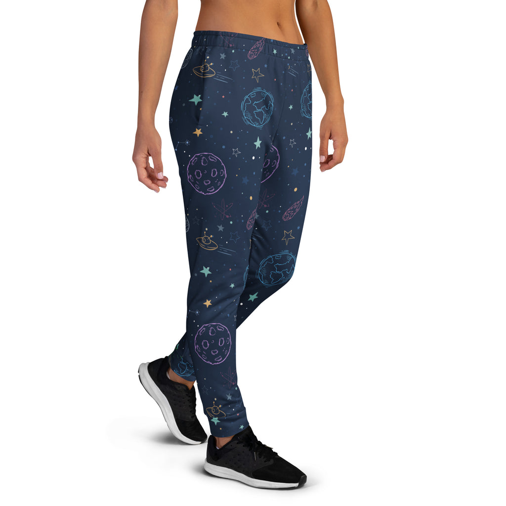 Dark blue women’s galaxy space joggers with embroidered pastel planets and ufos in cozy recycled fleece with pockets