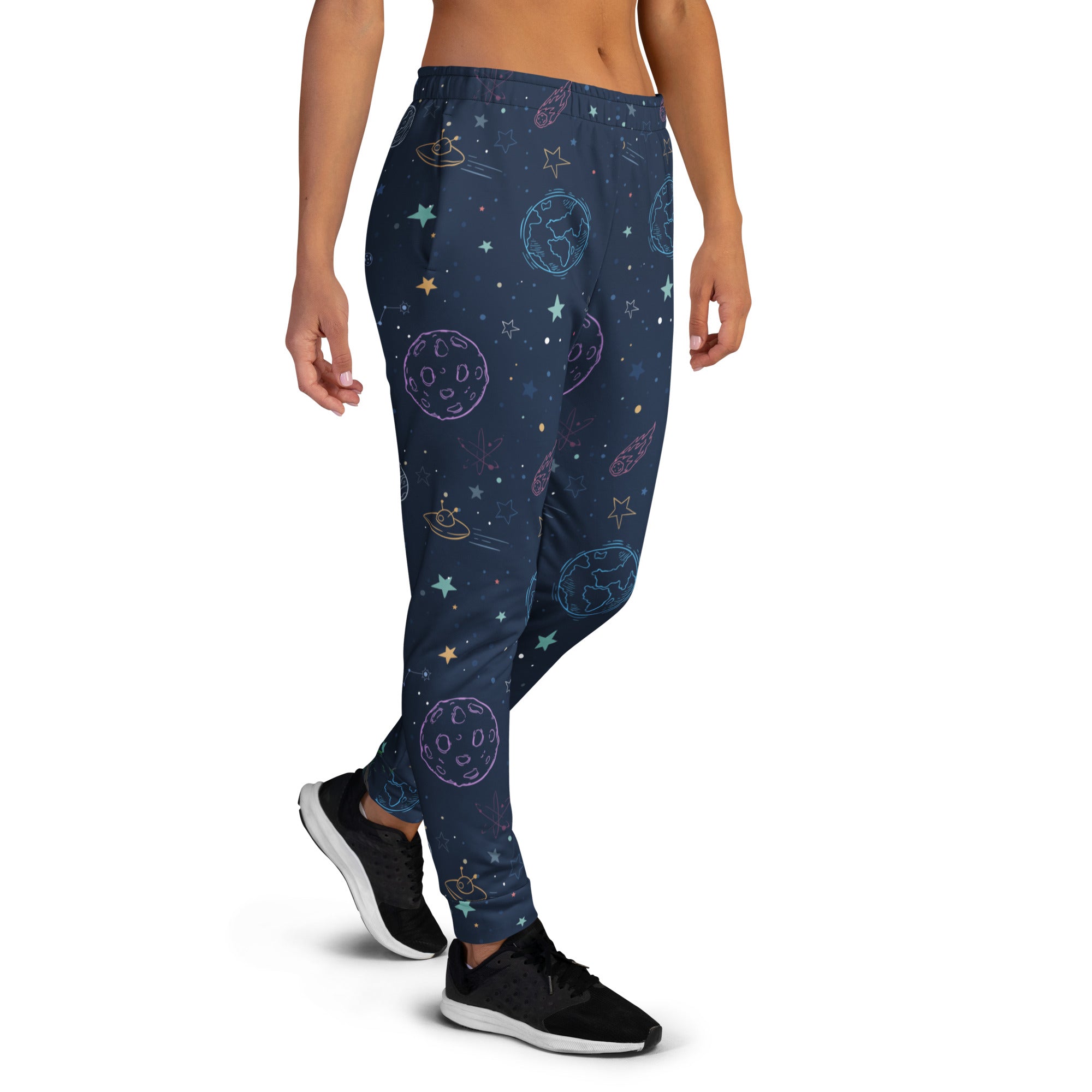 Dark blue women’s galaxy space joggers with embroidered pastel planets and ufos in cozy recycled fleece with pockets