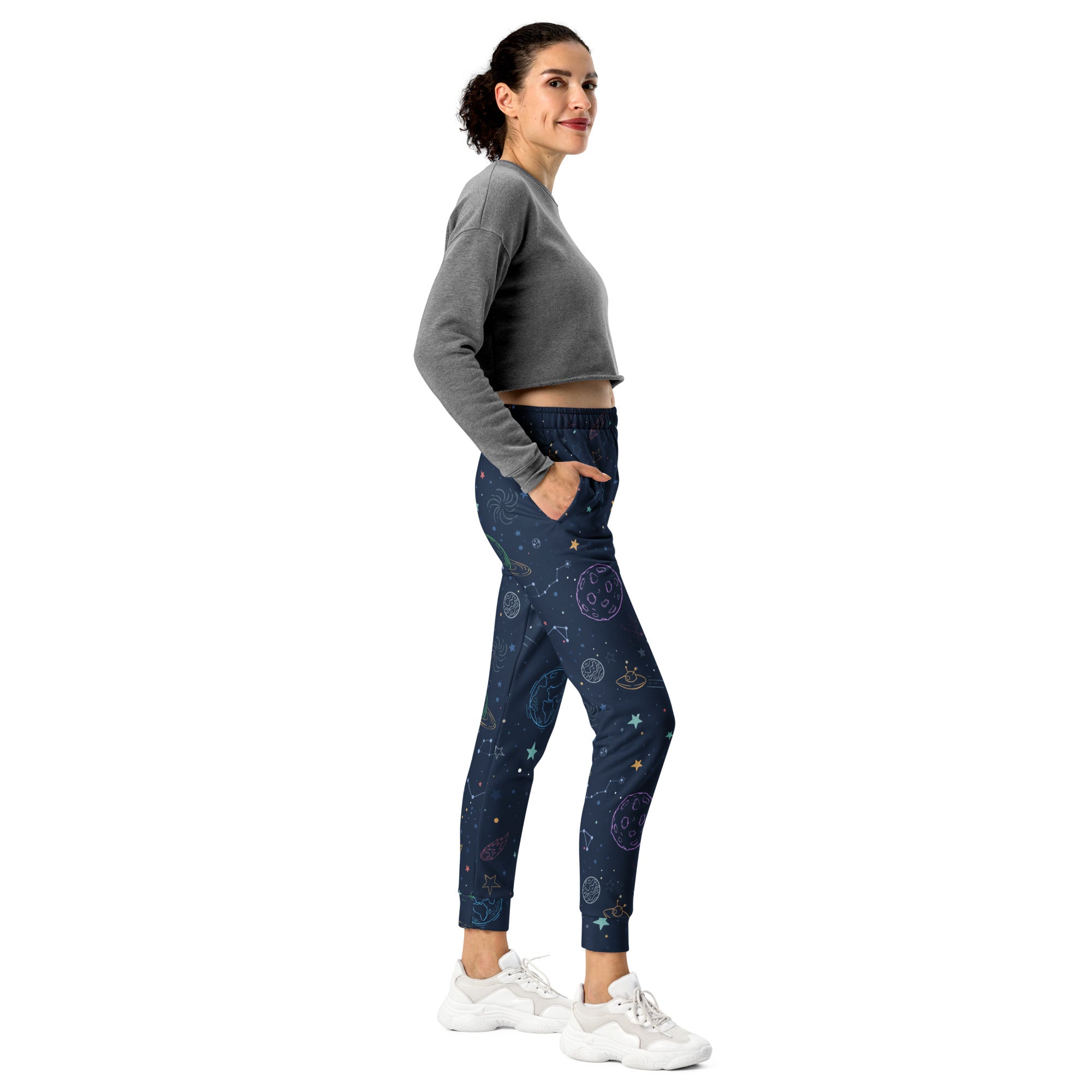 Women’s dark blue galaxy space recycled jogger pants with celestial patterns and cozy brushed fleece inside