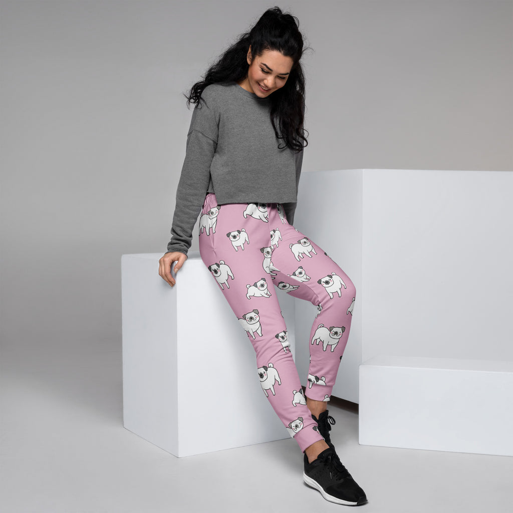 Women’s pink jogger pants with white pug pattern cozy brushed inside fleece and pockets made from recycled materials