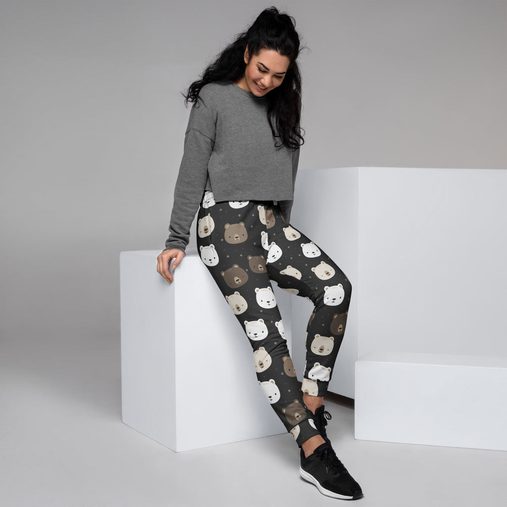 Dark gray women’s jogger pants with playful white beige and brown bear pattern cozy brushed fleece inside