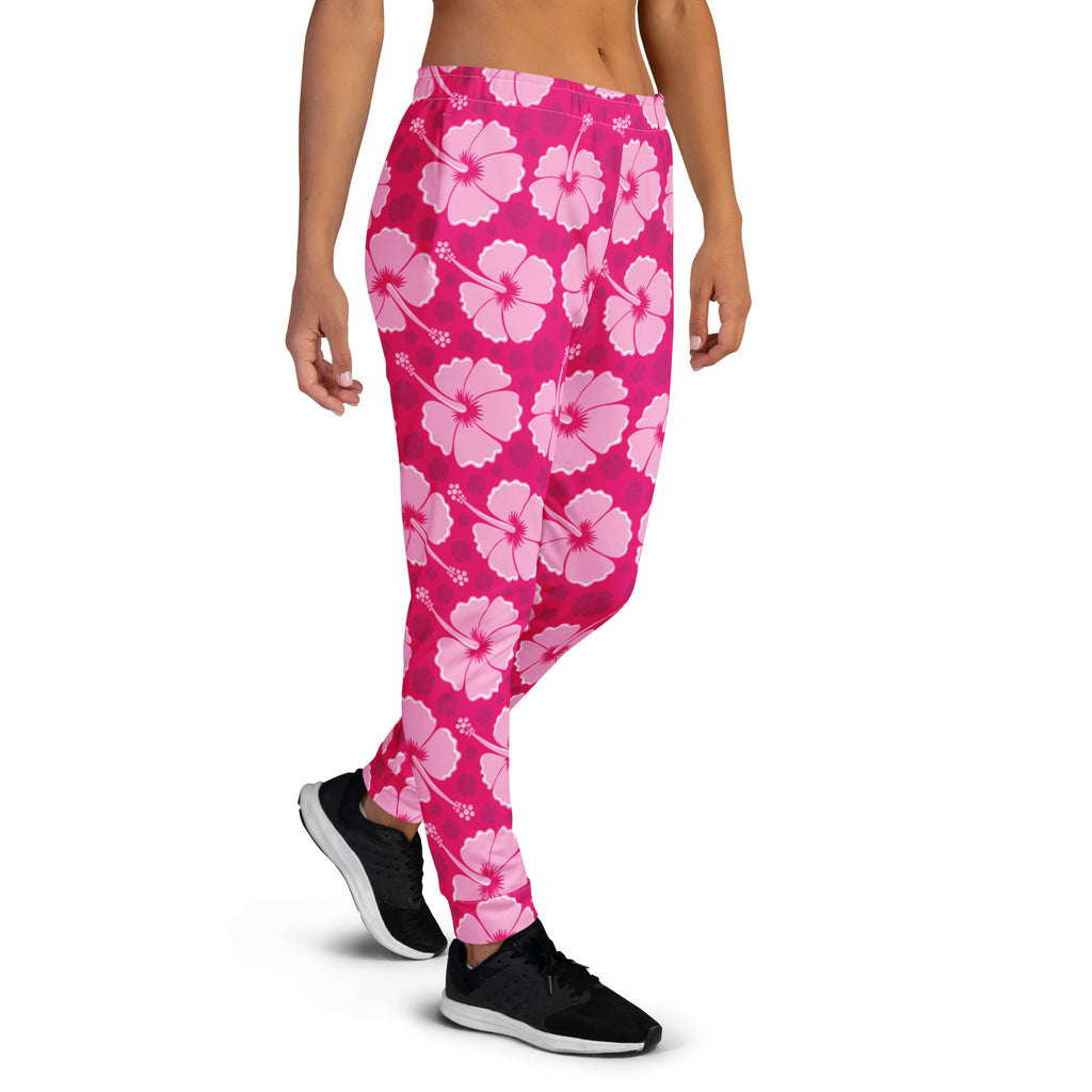 Women’s bright pink hibiscus floral recycled jogger pants with soft stretchy fabric and cozy brushed fleece inside