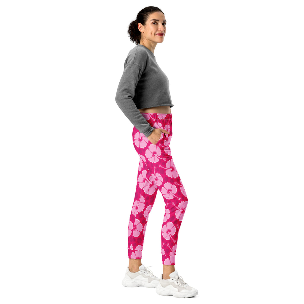 Women’s pink hibiscus floral recycled jogger pants with pockets featuring cozy brushed inside fleece and floral print