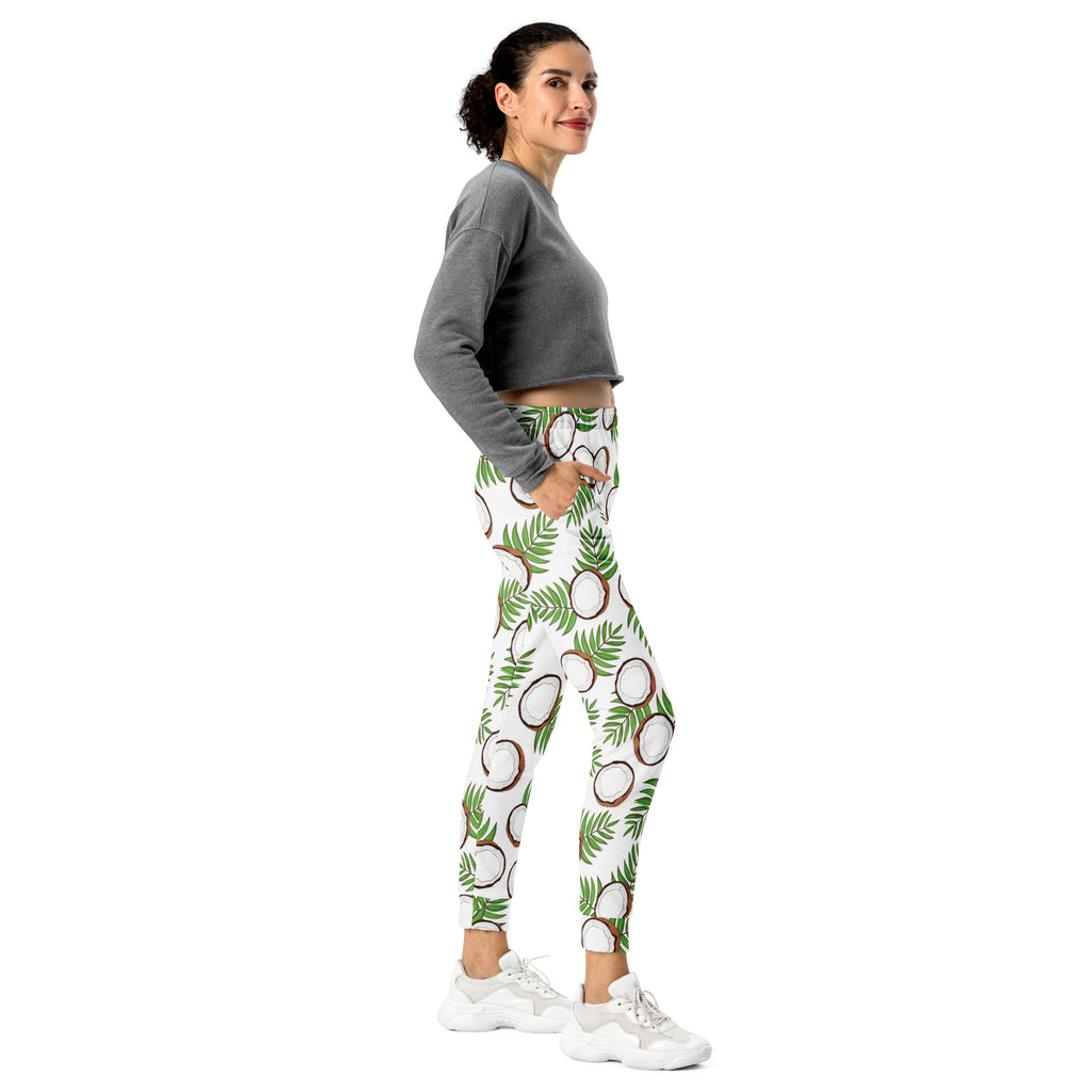 White leggings with vibrant green palm leaves and brown and white coconuts pattern cozy brushed fleece lining