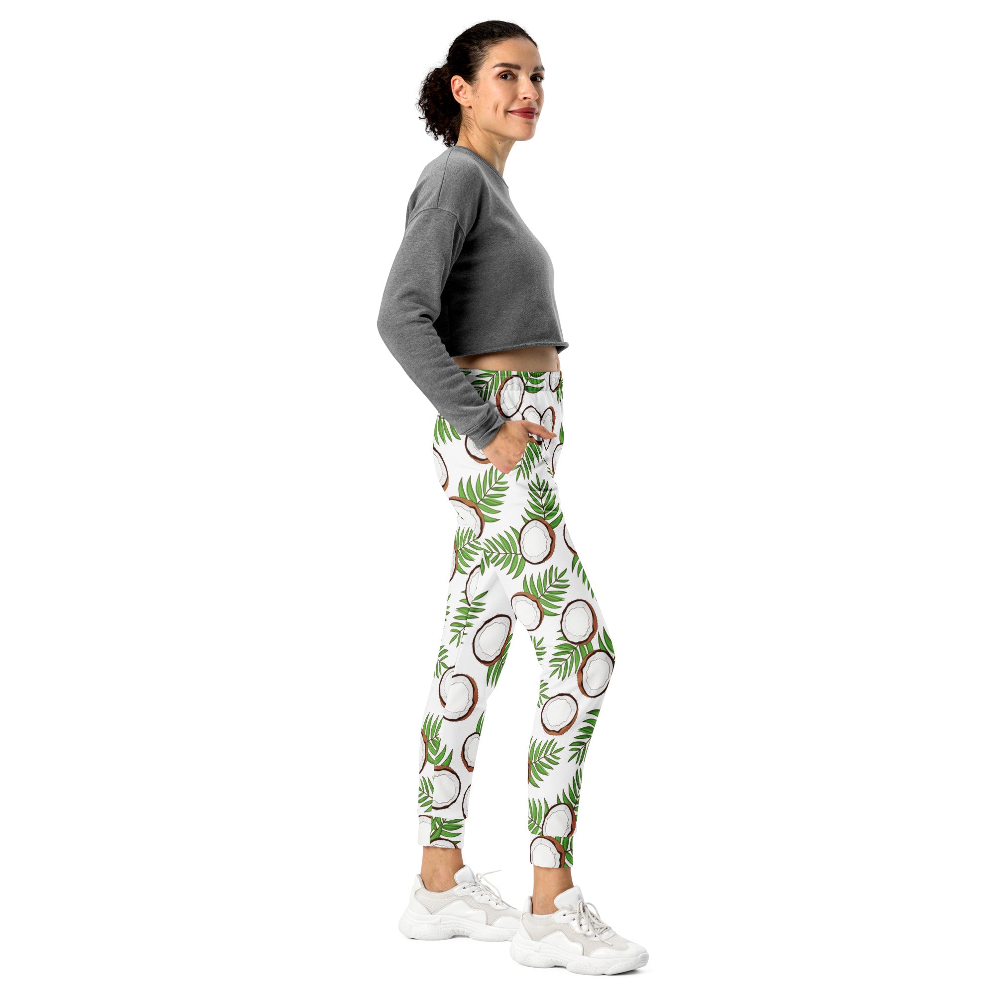 White leggings with vibrant green palm leaves and brown and white coconuts pattern cozy brushed fleece lining