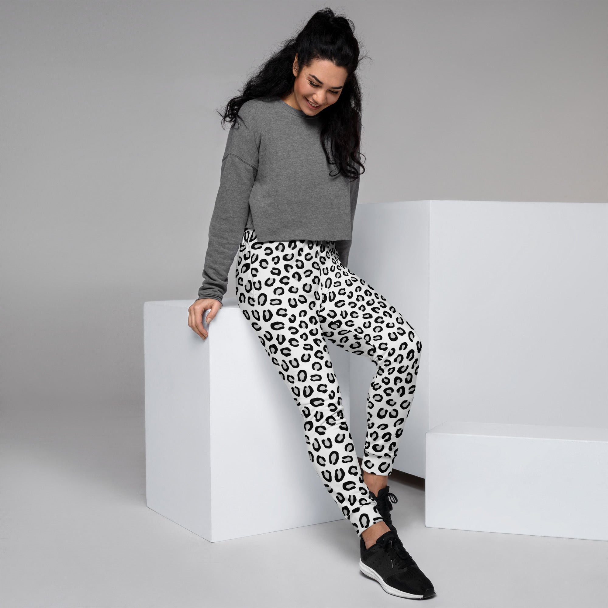 Women’s black and white leopard recycled jogger pants with cozy brushed inside fleece and pockets