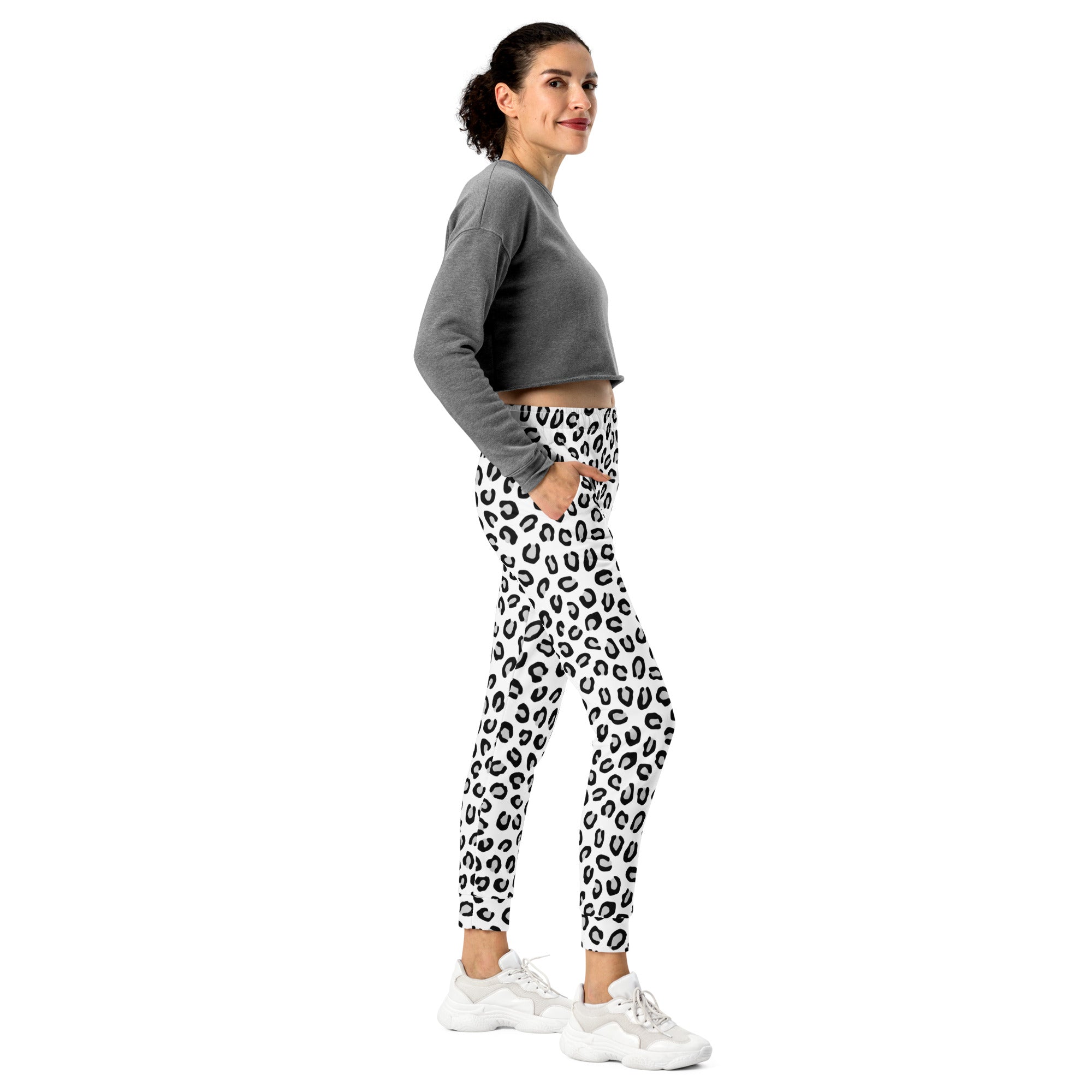 Women’s black and white leopard print recycled jogger pants with pockets and cozy brushed inside fleece lining