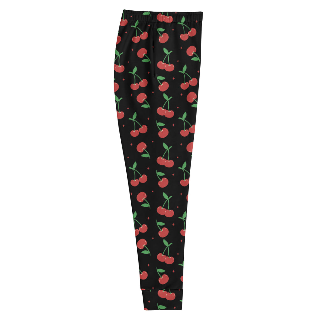 Women’s black cherry recycled jogger pants with pockets featuring red cherry pattern and cozy brushed fleece inside