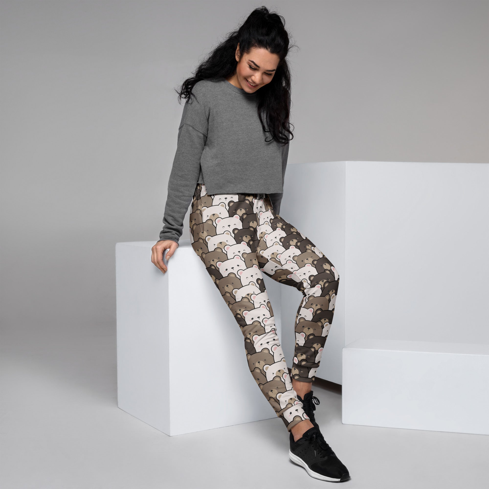 Cropped cartoon bear patterned leggings in beige and brown tones made from cozy brushed fleece with pockets