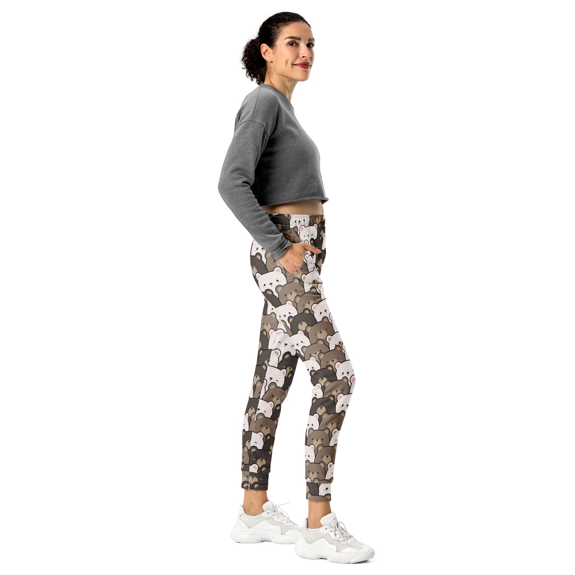 Women’s gray cropped long-sleeve top paired with recycled fleece jogger pants featuring bear face print and pockets