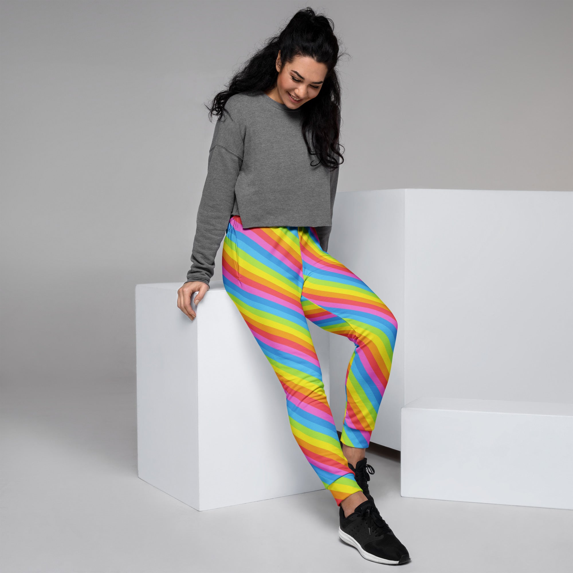 Women’s rainbow stripe recycled jogger pants with vibrant diagonal pattern cozy brushed inside fleece with pockets