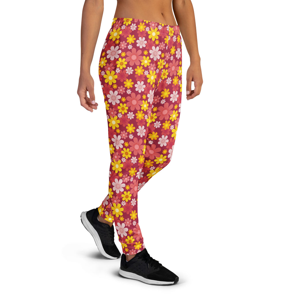 Women’s red floral recycled jogger pants with pink and yellow flowers cozy brushed fleece inside and pockets
