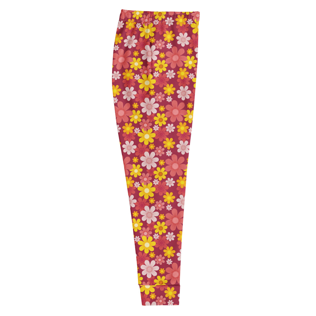 Women’s red floral recycled jogger pants with cozy brushed fleece inside and vibrant yellow pink white flower pattern
