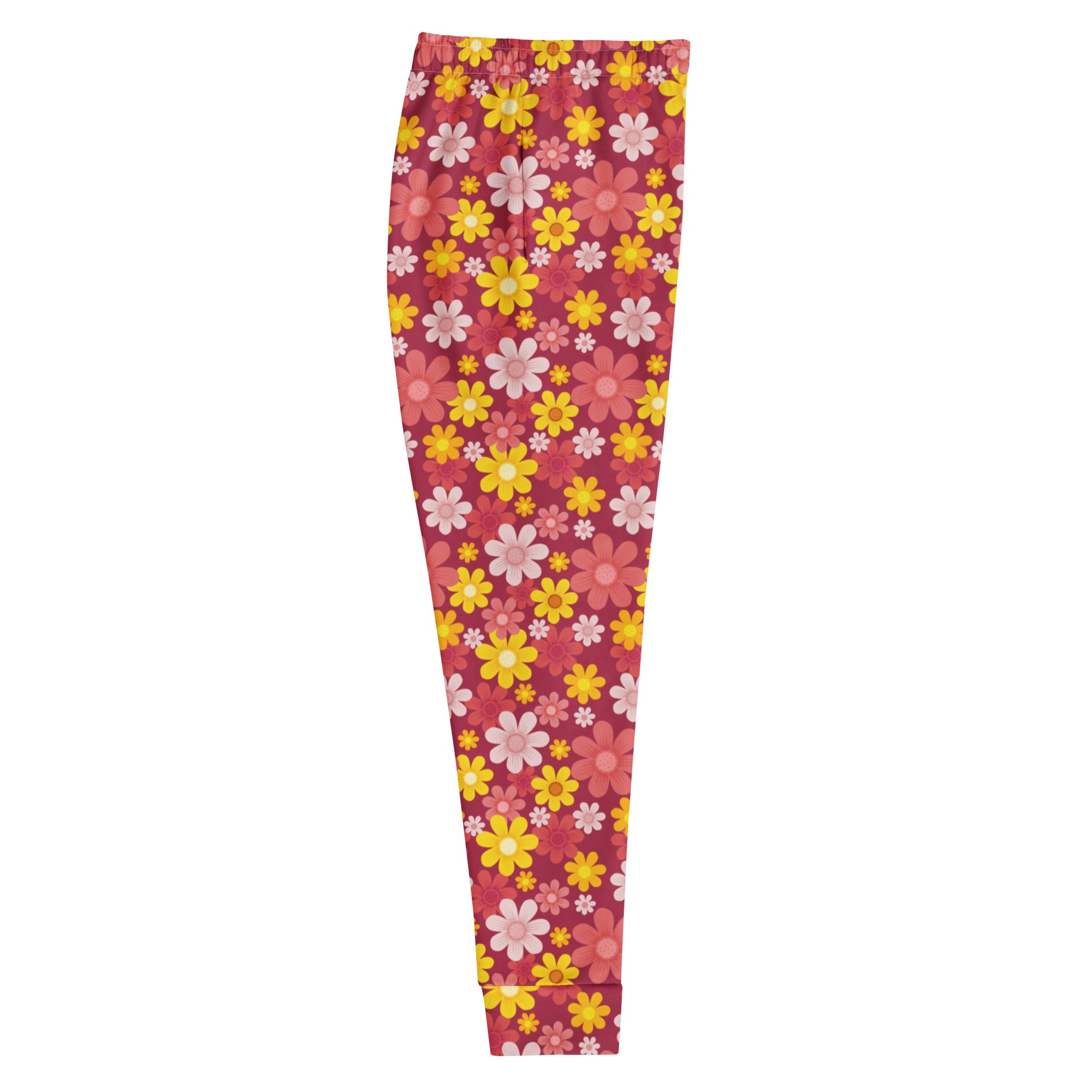 Women’s red floral recycled jogger pants with cozy brushed fleece inside and vibrant yellow pink white flower pattern