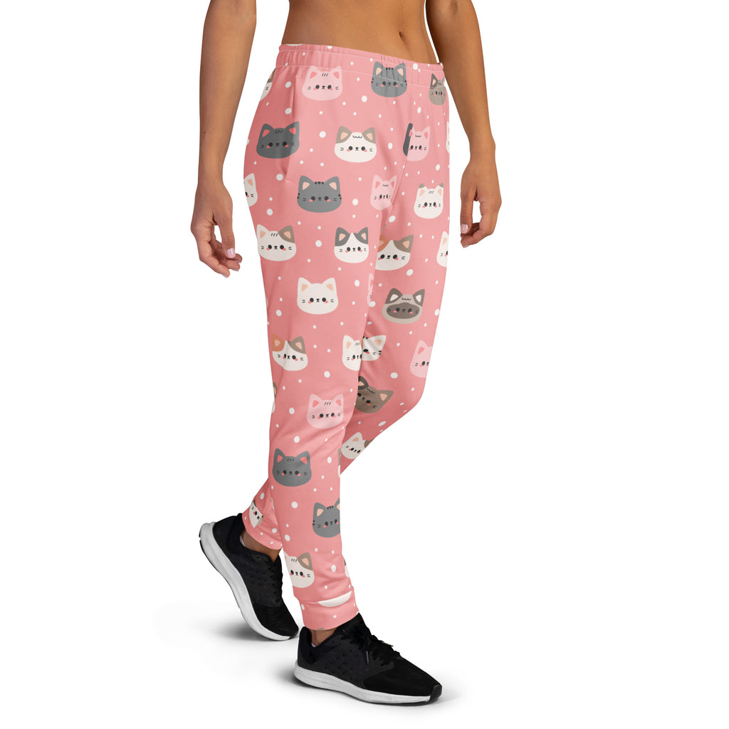 Women’s pink recycled jogger pants with playful gray white and pink cartoon cat faces and cozy brushed fleece lining