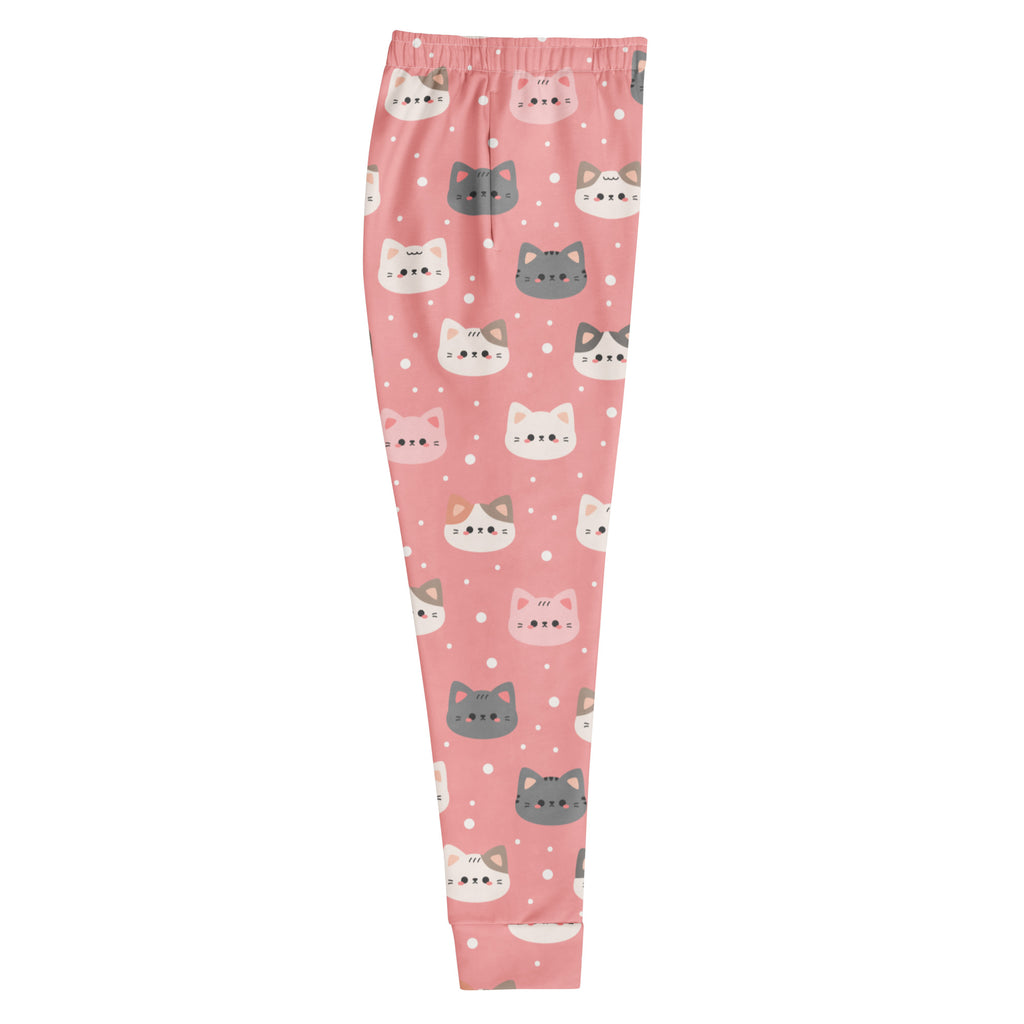 Women’s pink recycled jogger pants with cozy fleece inside featuring white and gray cartoon cat faces with bows