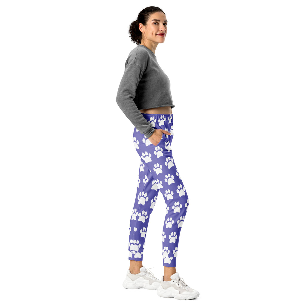 Women’s purple paw print recycled jogger pants with pockets featuring cozy brushed inside fleece and white paw prints