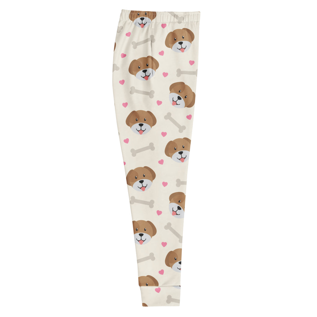 Cream-colored womens recycled jogger pants with brown puppy faces pink hearts gray bones cozy brushed fleece
