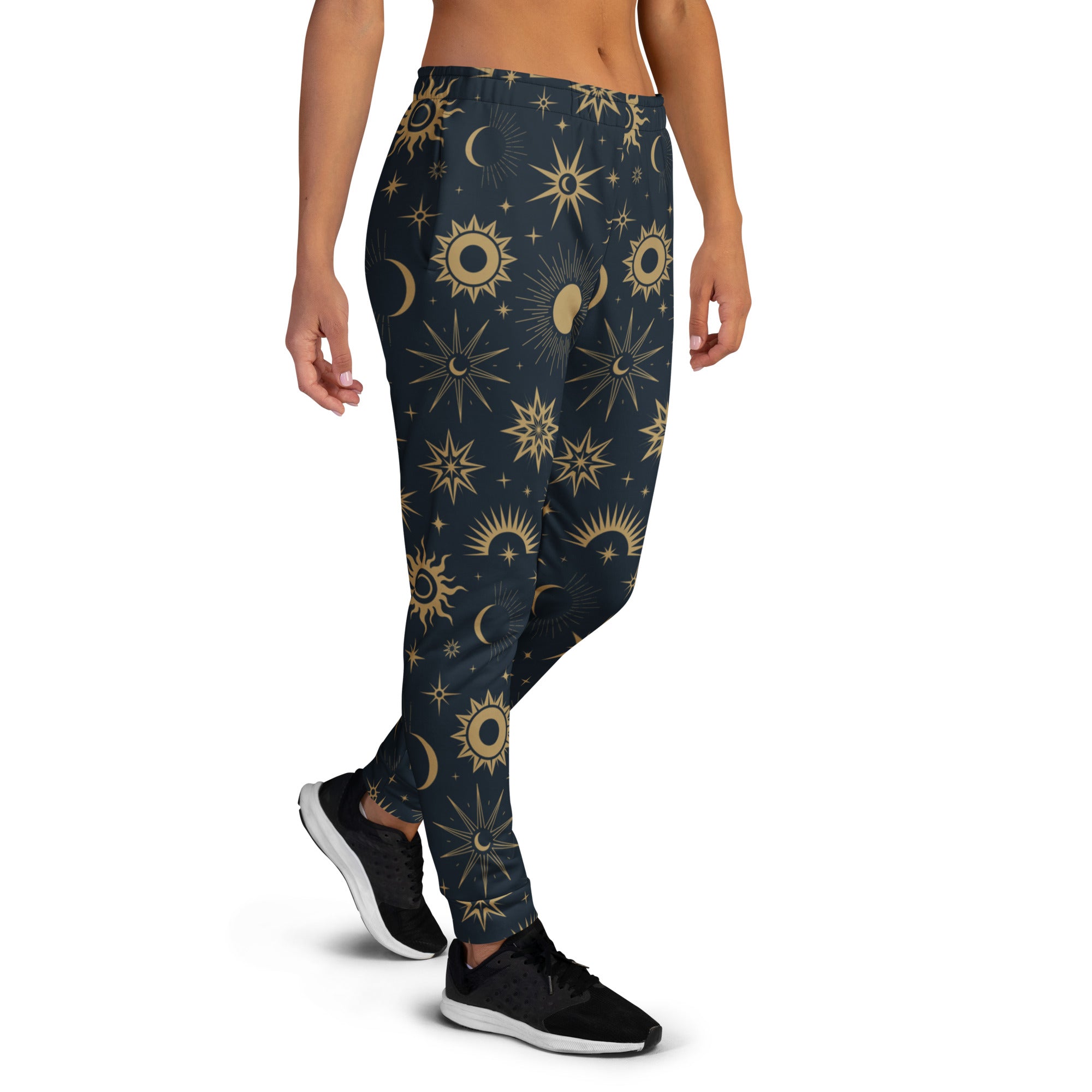 Women’s dark blue recycled jogger pants with vibrant gold celestial sun moon and star pattern and cozy fleece lining