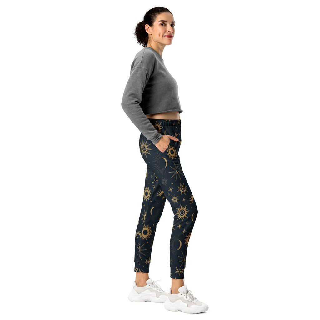 Women’s dark blue recycled jogger pants with gold celestial suns moons stars and cozy brushed inside fleece lining