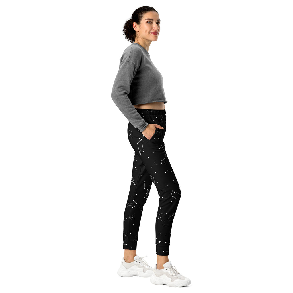 Women’s black jogger pants with starry constellation pattern made of recycled cozy brushed inside fleece with pockets
