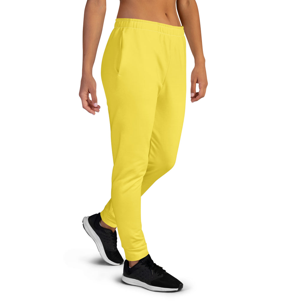 Women’s bright yellow recycled jogger pants with elastic waistband tapered legs and cozy brushed fleece inside