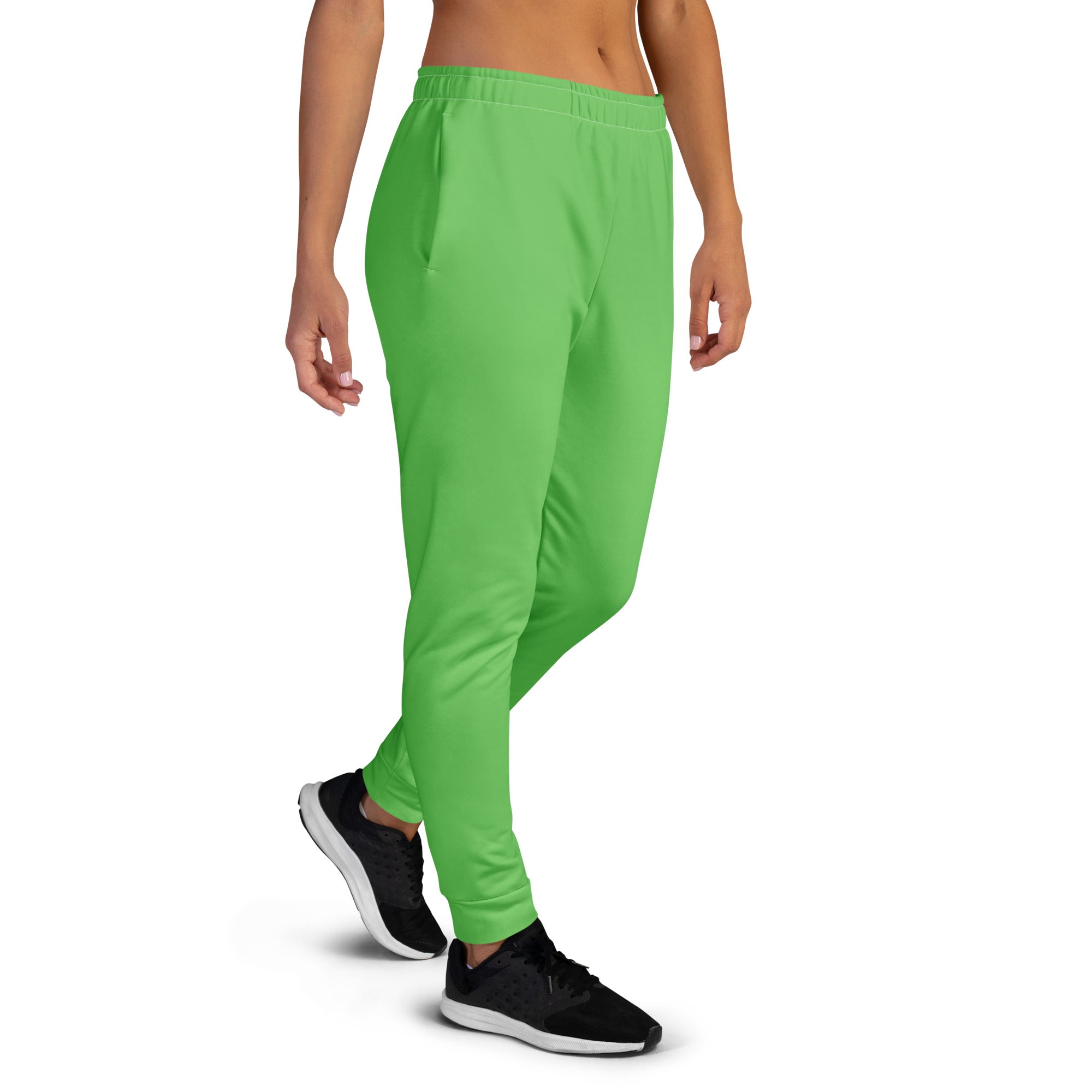 Women’s bright green recycled jogger pants with soft stretchy fabric tapered legs and cozy brushed inside fleece