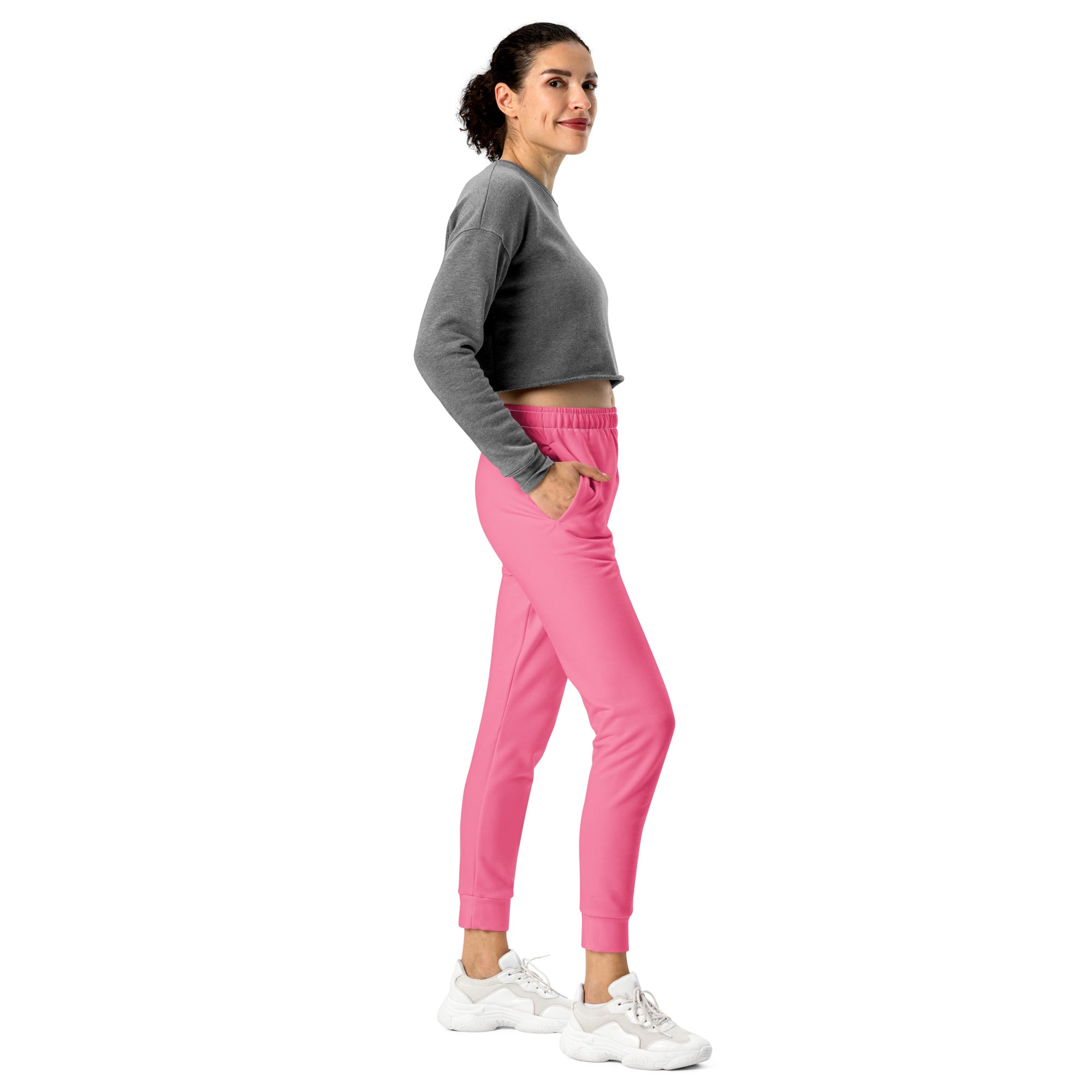 Women’s bright pink recycled jogger pants with elastic waistband cuffed ankles and cozy brushed inside fleece lining