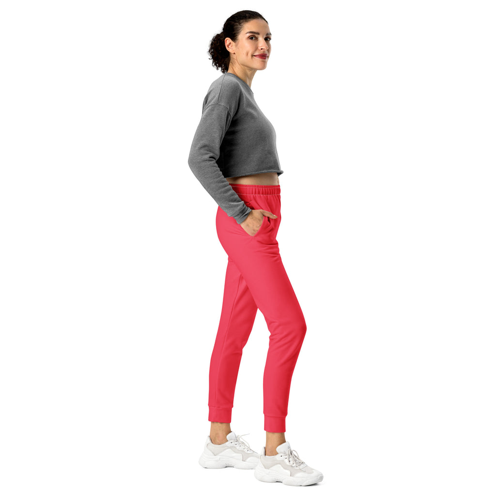 Vibrant coral pink women’s jogger pants with elastic waistband cuffed ankles cozy brushed fleece and pockets