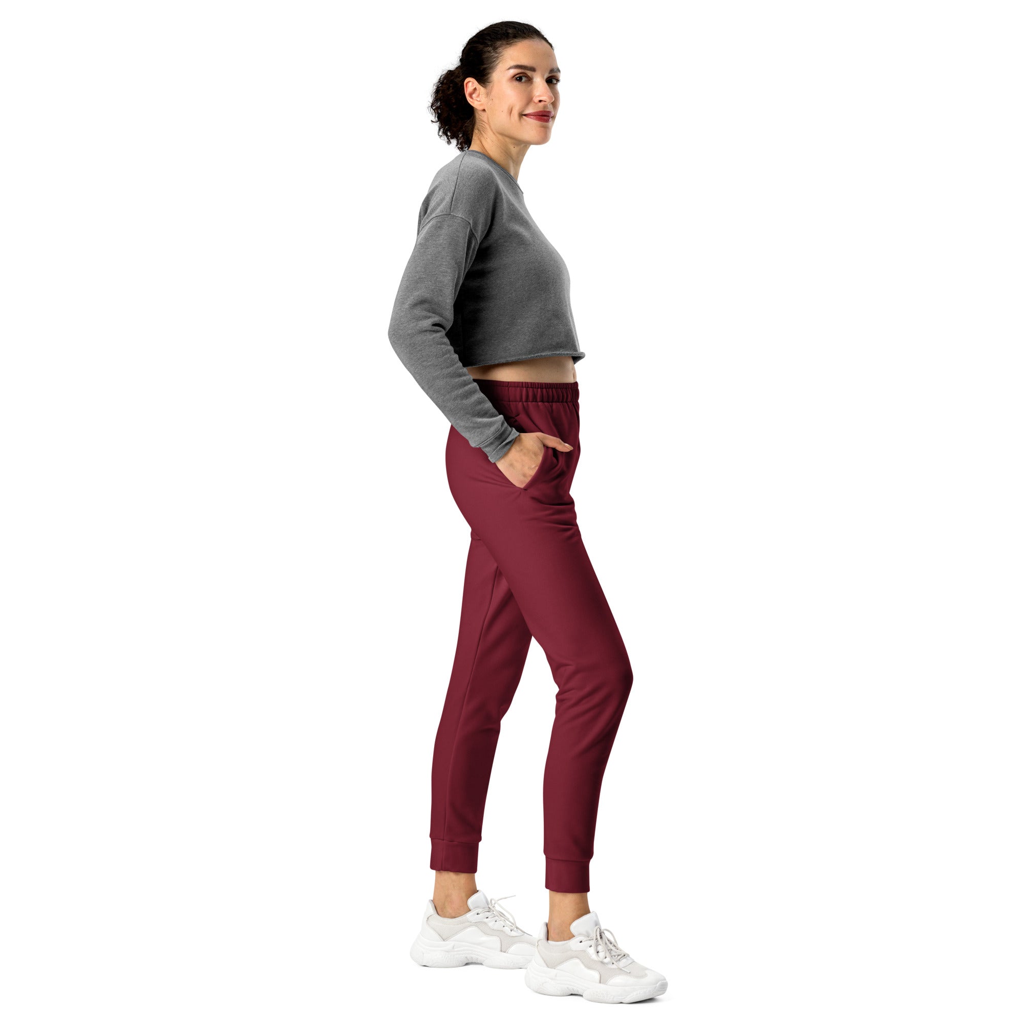 Women’s burgundy recycled jogger pants with elastic waistband side pockets and cozy brushed inside fleece lining