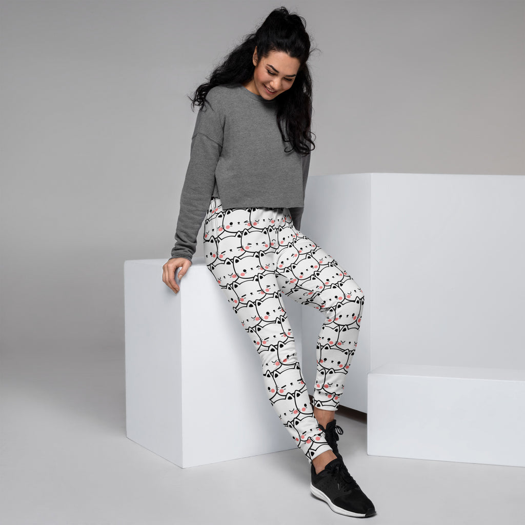 Women’s white cat print recycled jogger pants with pockets featuring cute cartoon cats and cozy brushed fleece inside